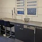 아파트 Waldstadt Homes, 이제를론